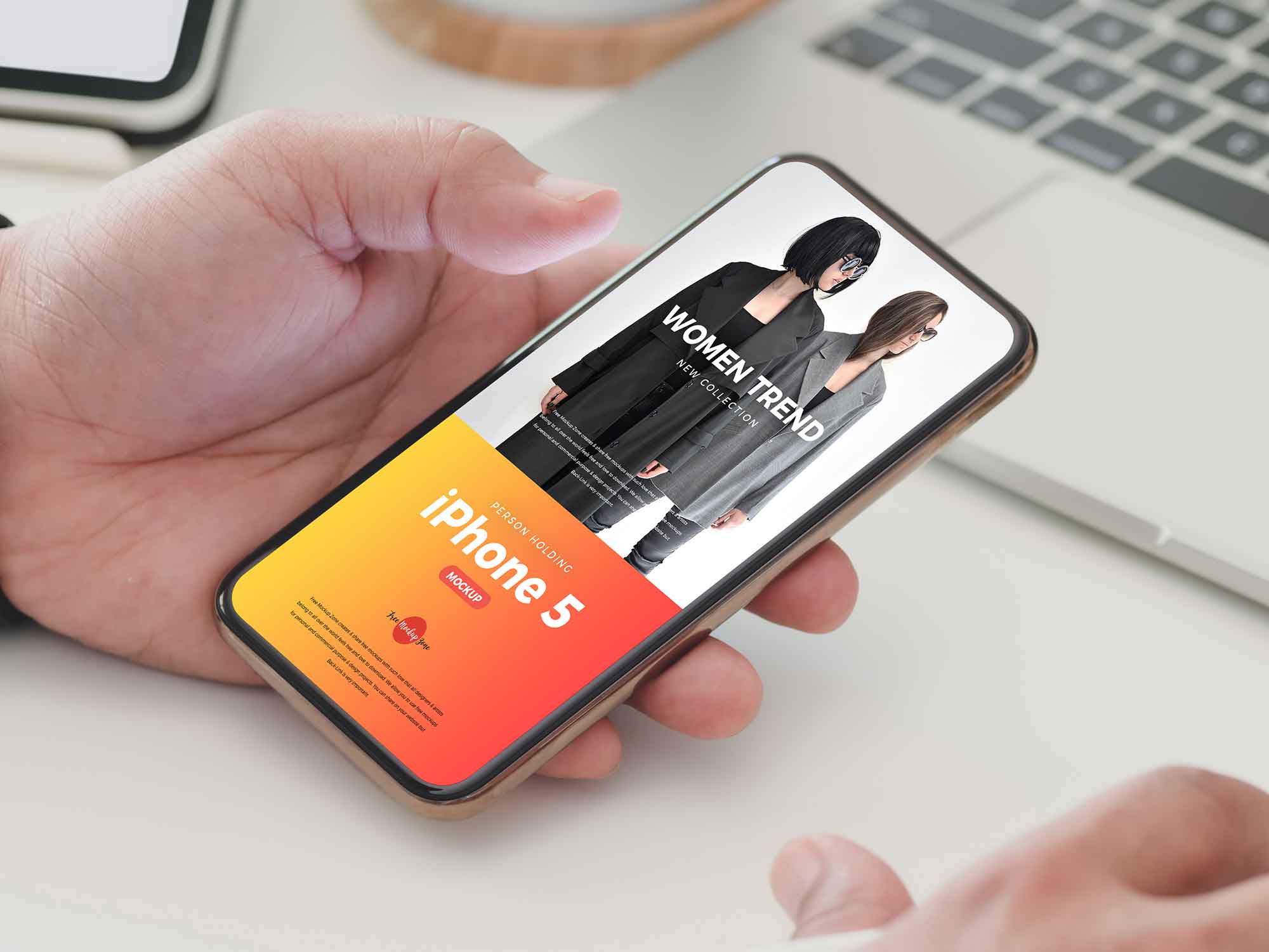 Free Person Holding Phone Mockup (PSD)