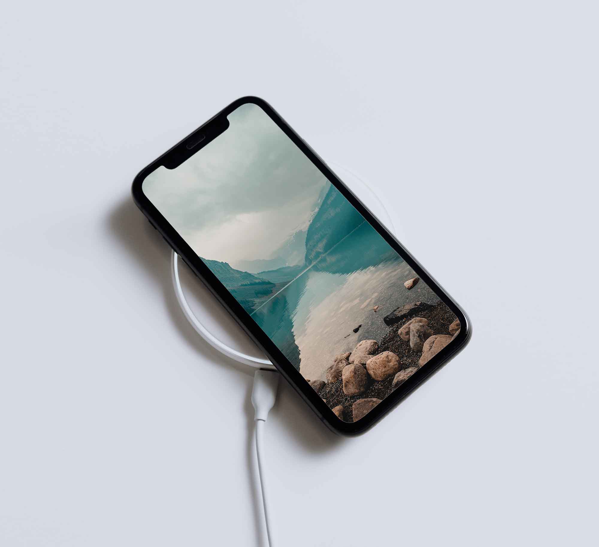 Free Phone on Wireless Charger Mockup (PSD)