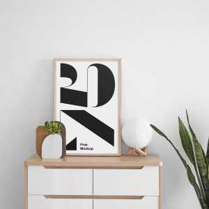 Free Poster on Cabinet Mockup (PSD)
