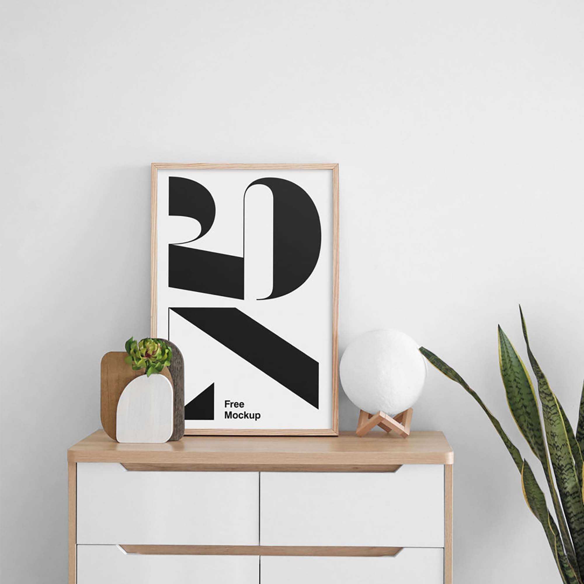 Free Poster on Cabinet Mockup (PSD)
