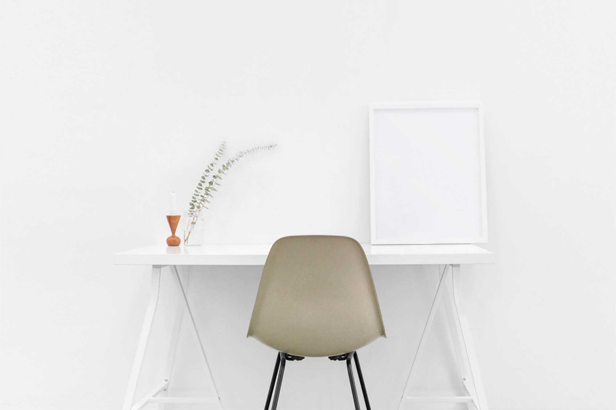 Free Poster on Table Mockup (PSD)