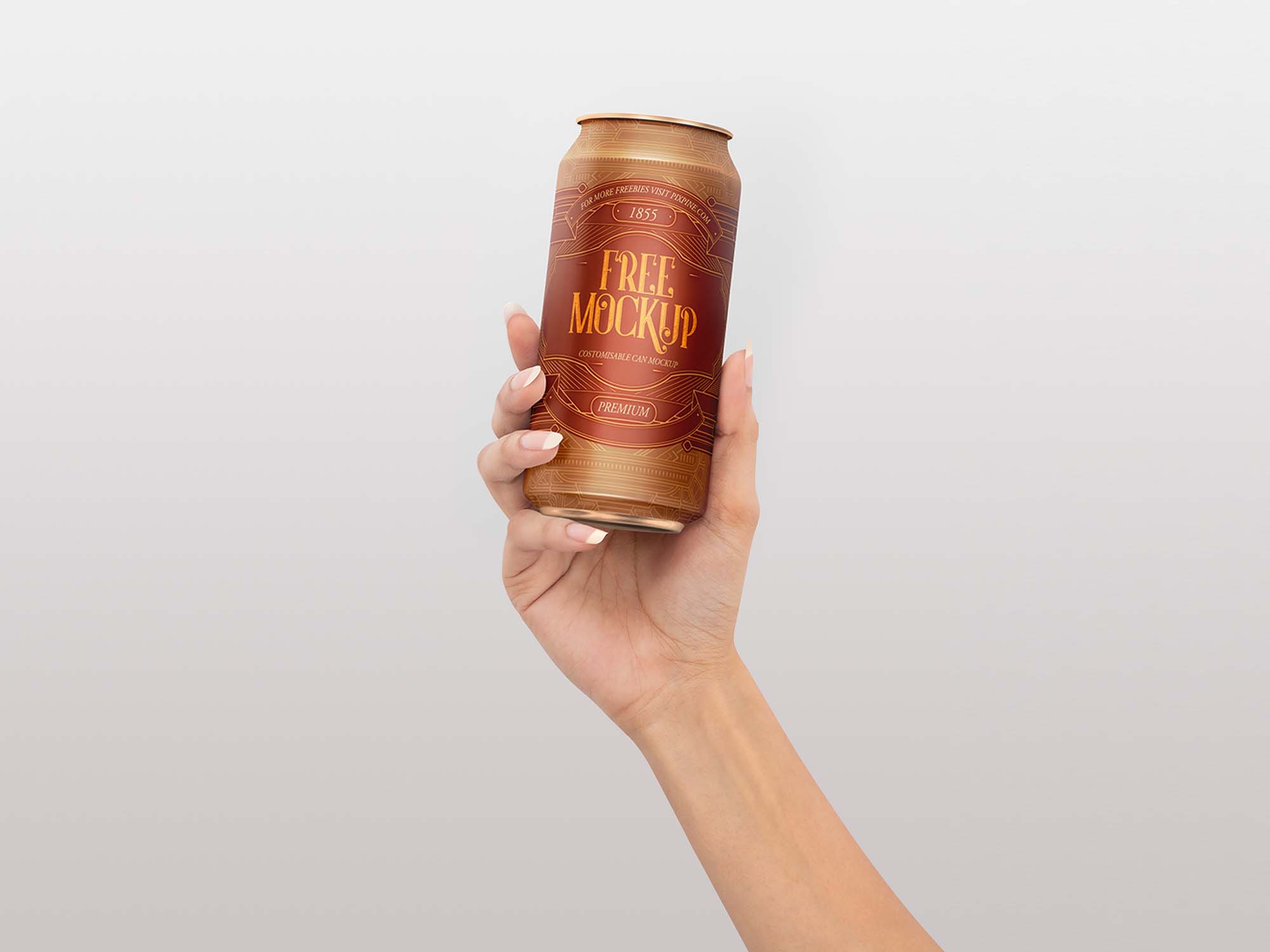 Free Soda Can in Hand Mockup (PSD)