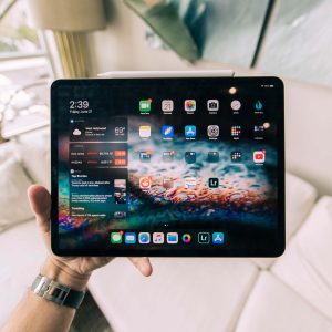 Free Tablet in Hand Mockup (PSD)