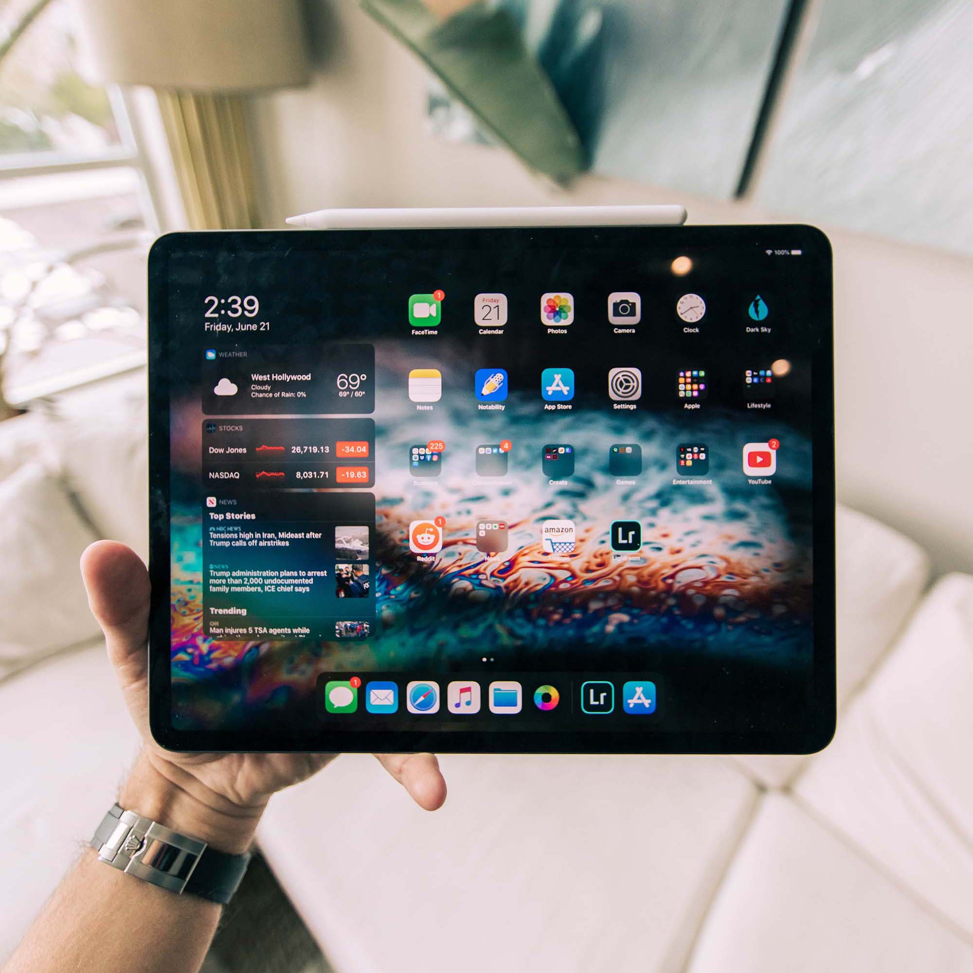 Free Tablet in Hand Mockup (PSD)
