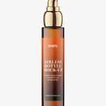 Glass bottle with airless pump mockup / amber