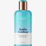 Glossy bottle with disctop mockup