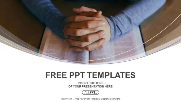 Hands of are folded in prayer over the book PowerPoint Templates