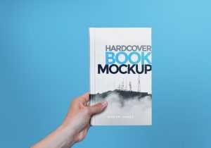 Hardcover Book In Hand Mockup