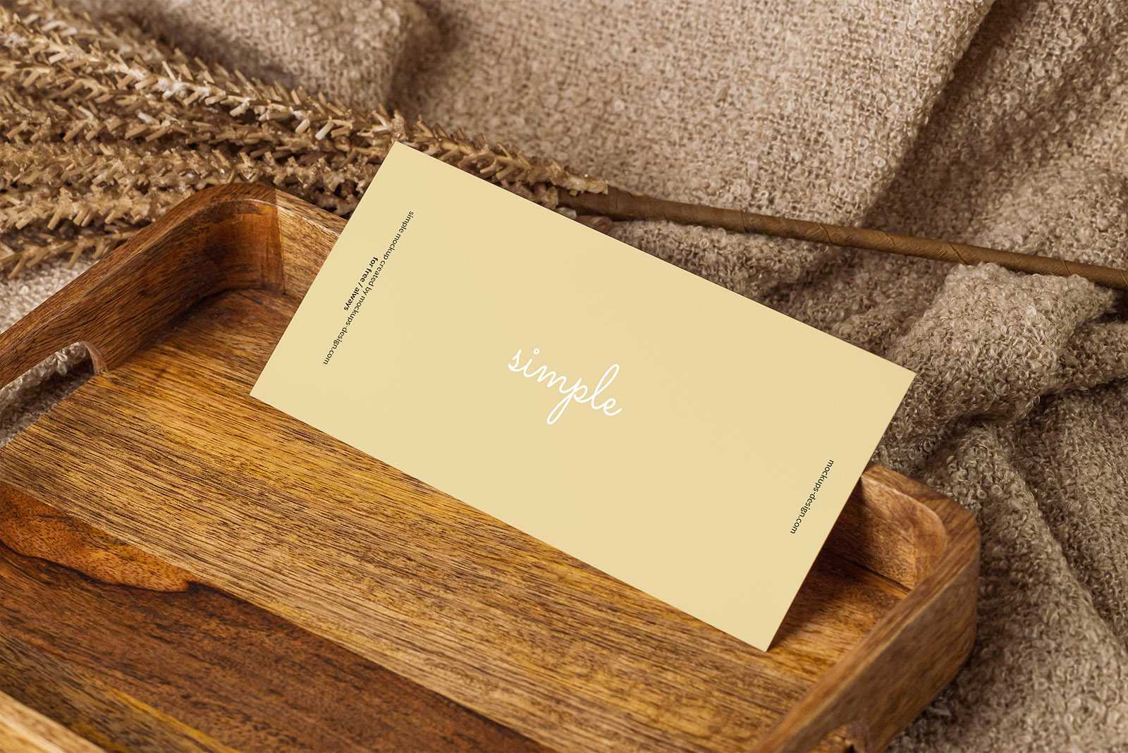 Horizontal DL flyer in wooden tray mockup