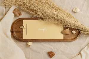 Horizontal DL flyer on wooden tray mockup