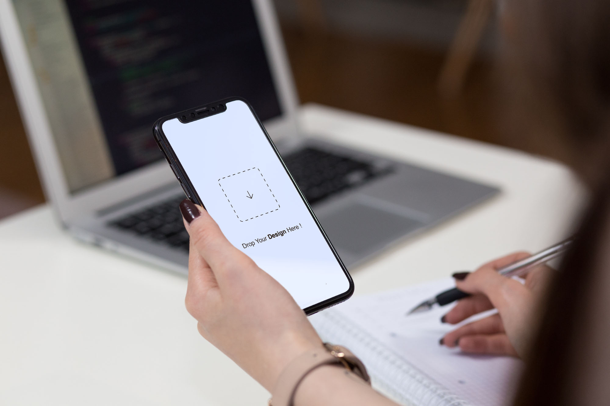 iPhone in Hand Mockup (PSD)