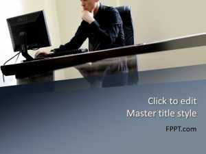 Man Working at Desk PowerPoint Template