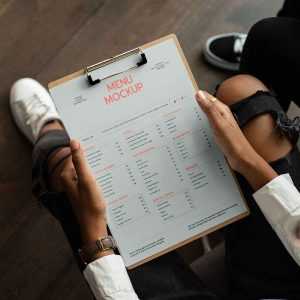 Menu in Hands Mockup