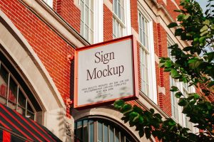 Sign on Brick Building Mockup (PSD)