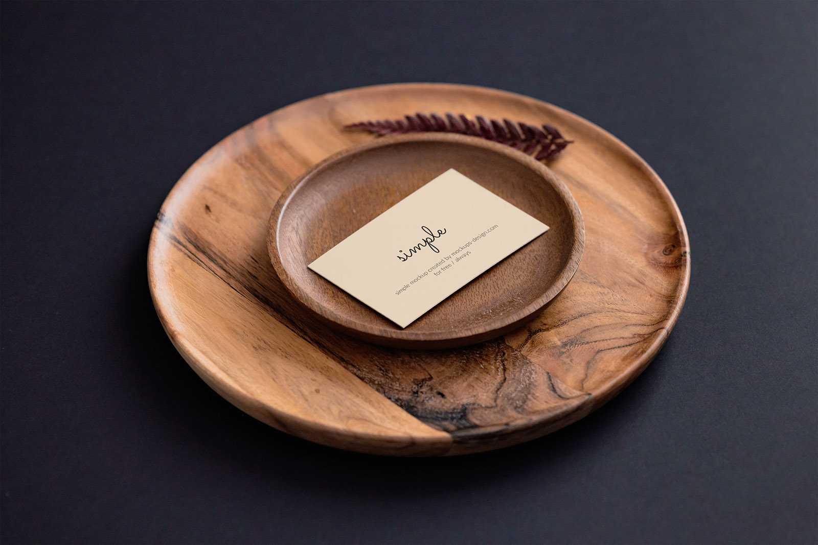 Single business card on black background mockup