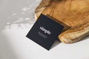 Square flyer with wooden board mockup