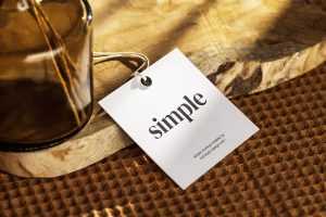 Square label tag on wooden slice mockup