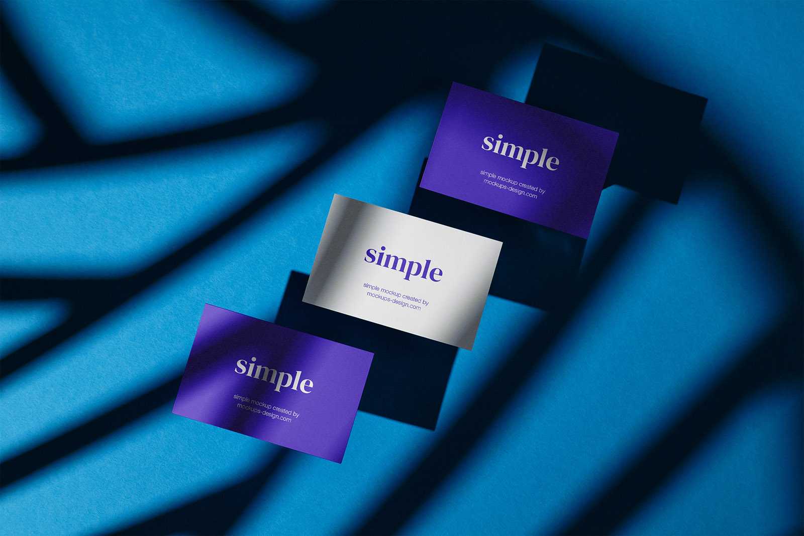 Three business card on blue background mockup