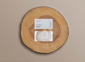 Free Business Card on Wood Slice Mockup (PSD)