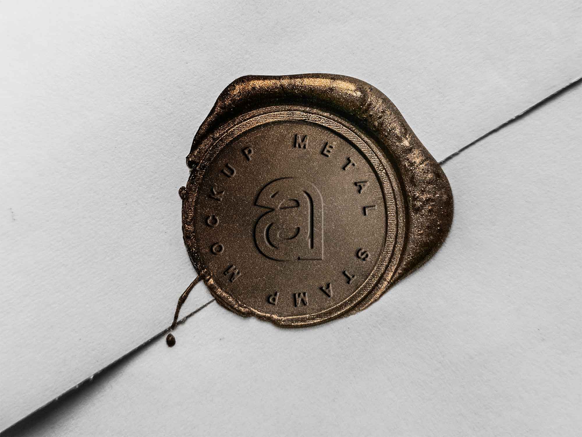 Free Metal Stamp Logo Mockup (PSD)