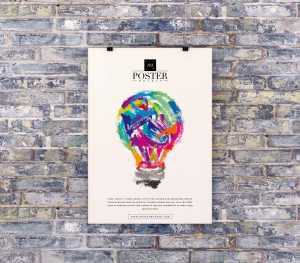 Free Poster on Brick Wall Mockup (PSD)