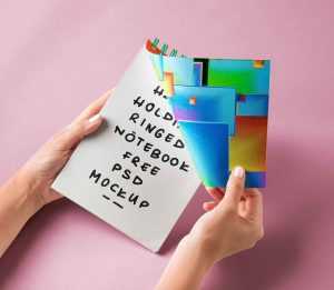Hand Holding Ringed Notebook Mockup