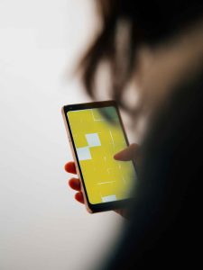 Hand Holding Smartphone Mockup