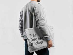 Man Carrying Tote Bag Mockup